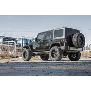 Rough-Country-1053-Spare-Tire-Spacer-Bracket-Jeep-Wrangler-YJ-TJ-JK-Installed-Full-Outside.jpg